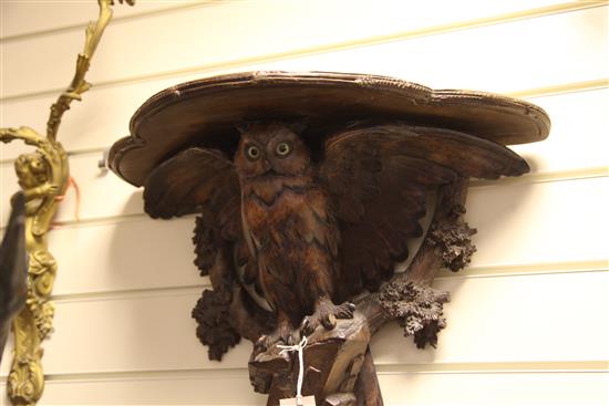 A late 19th / early 20th century Black Forest carved wall bracket, 20.5in.